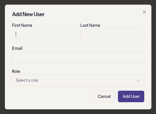 The Add New User dialog: first name, last name, email, and role
